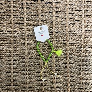 Selling a green bracelet, kid size.